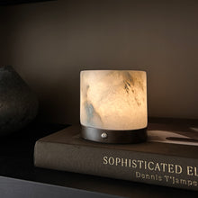 Column cordless alabaster stone table lamp styled with warm ambient lighting
