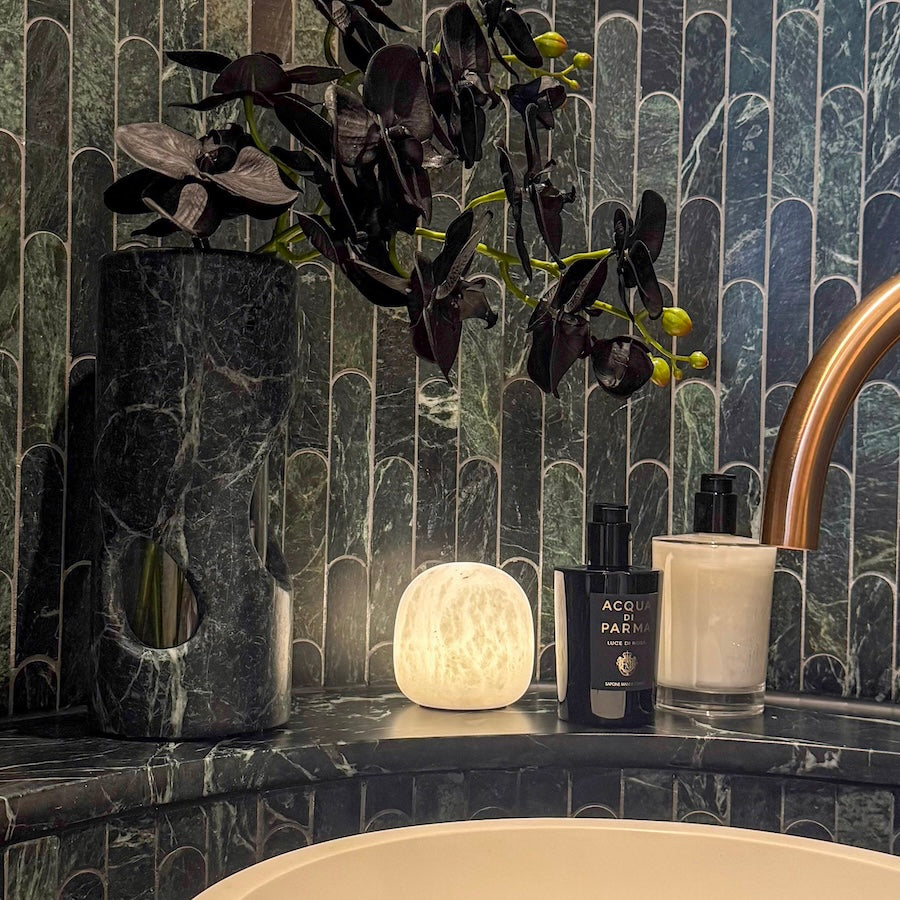 Cove rechargeable alabaster lamp showing natural stone veining and translucency