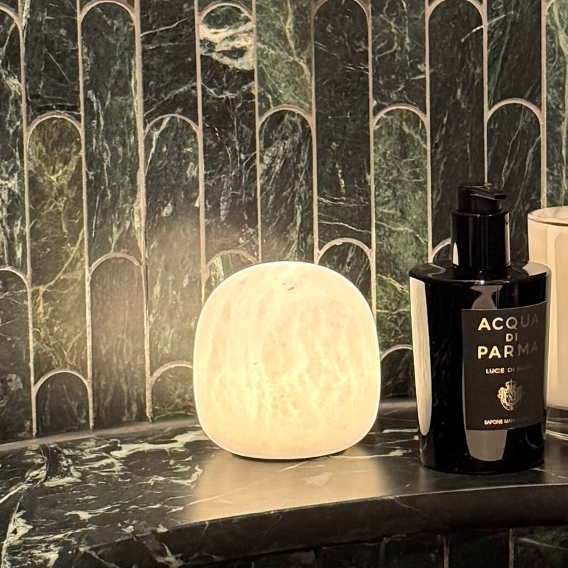 Cove Spanish alabaster stone lamp illuminated with warm ambient light