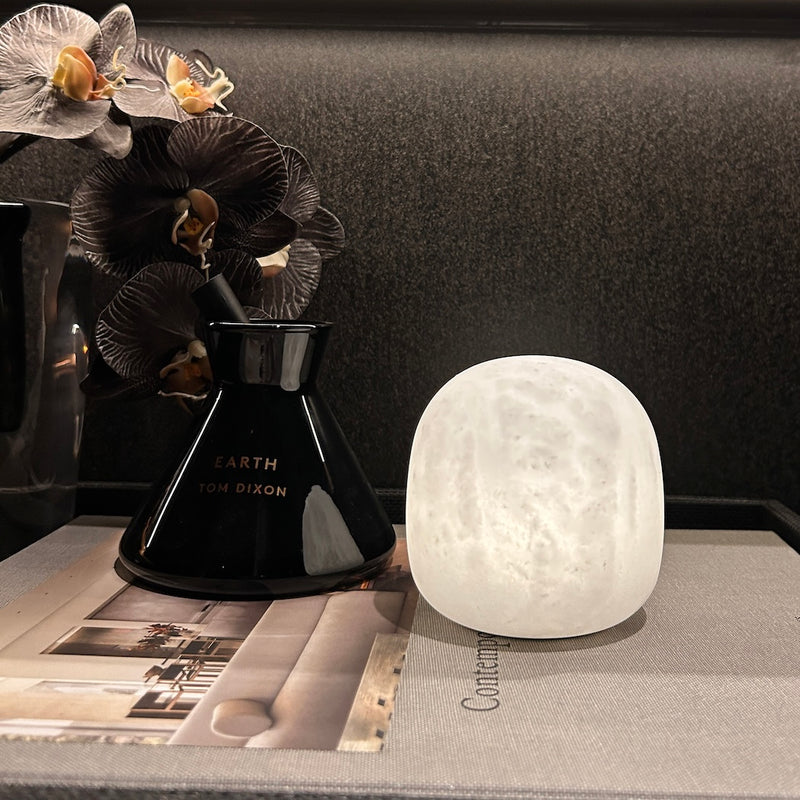 Cove Spanish alabaster cordless lamp illuminated and touch dimmed