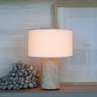 Travertine stone portable table lamp with fabric shade by Lokah & Co