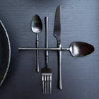 Matte black stainless steel sculpted cutlery set by Lokah Co