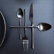 Matte black stainless steel sculpted cutlery set by Lokah Co