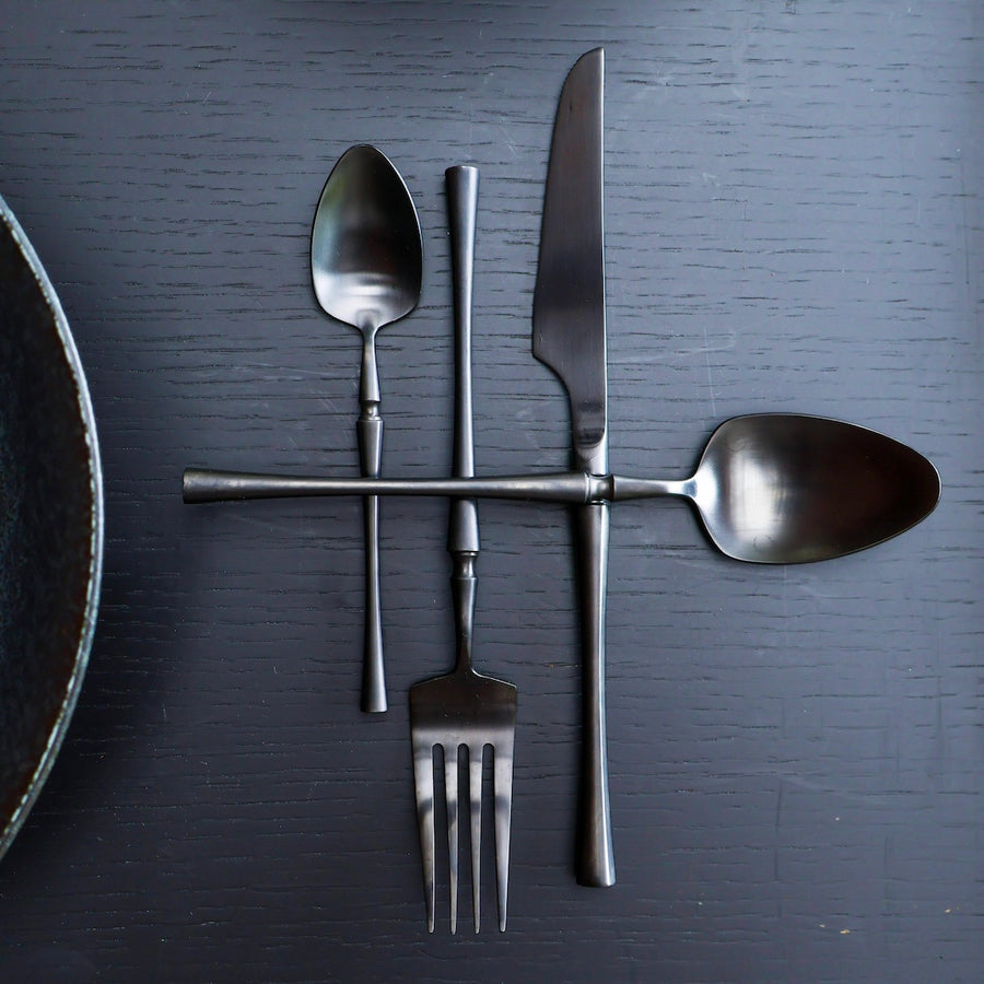 Matte black stainless steel sculpted cutlery set by Lokah Co